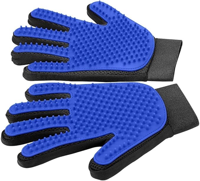 The Pet Grooming & Deshedding Glove – Gentle Hair Remover for Dogs & Cats, shown in blue and black with silicone massage tips, is laid flat palm side up to highlight its textured brushing and deshedding surface.