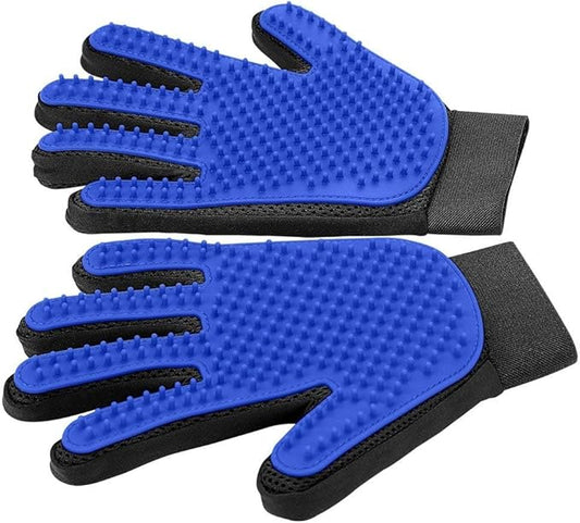The Pet Grooming & Deshedding Glove – Gentle Hair Remover for Dogs & Cats, shown in blue and black with silicone massage tips, is laid flat palm side up to highlight its textured brushing and deshedding surface.