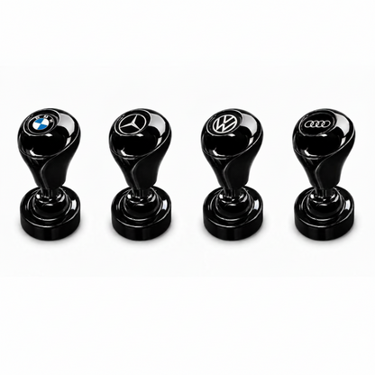 Four Car Start/Stop Button Joysticks, arranged in a row on a white background, feature BMW, Mercedes-Benz, Volkswagen, and Audi logos—making them unique luxury car interior accessories.