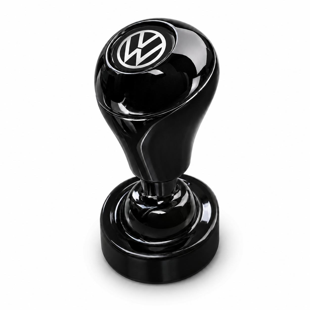 A glossy black Car Start / Stop Button Joystick with a round handle and the white Volkswagen logo on top, resembling a luxury car upgrade or engine button cover, is displayed against a plain white background.