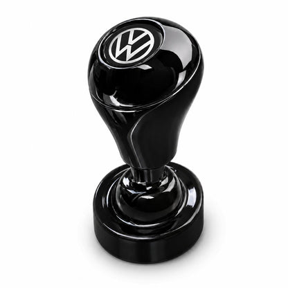 A glossy black Car Start / Stop Button Joystick with a round handle and the white Volkswagen logo on top, resembling a luxury car upgrade or engine button cover, is displayed against a plain white background.